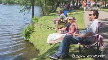 Families enjoy the ‘Carp Classic’ fishing tournament at the Riverfront Rendezvous - WSAW
