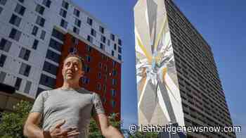 Graffiti artist completes world's tallest mural in downtown Calgary - Lethbridge News Now
