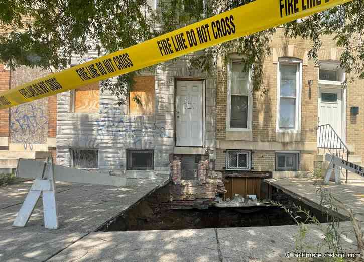 Large Sinkhole Opens Up In Front Of East Baltimore Row Homes