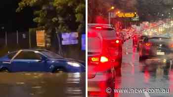 Major roads flood, plunge drivers into chaos - news.com.au