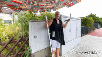 30 Grad zu viel für Telekom-Kasten: Kein Internet ohne Sonnenschirm - BILD