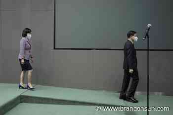 Hong Kong's John Lee stresses balance in easing quarantine - The Brandon Sun