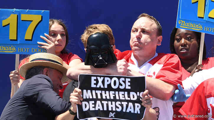 Joey Chestnut Puts Protestor in Chokehold During Nathan's Hot Dog Eating Contest, Still Wins! (Video)