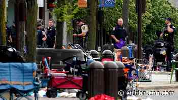 Suspect in custody after July 4th parade shooting