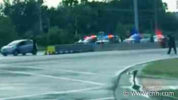 Video shows parade shooting suspect being taken into custody