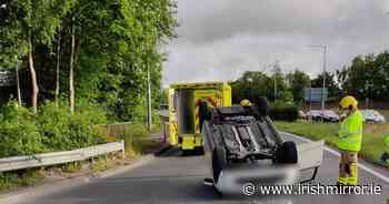 Major Dublin roundabout closed as car overturns in terrifying early-morning crash - Irish Mirror