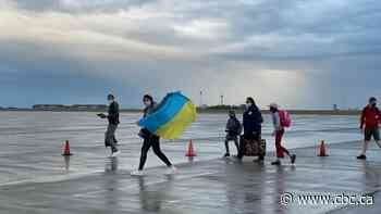 Work to settle 230 displaced Ukrainians begins after plane arrives in Saskatchewan