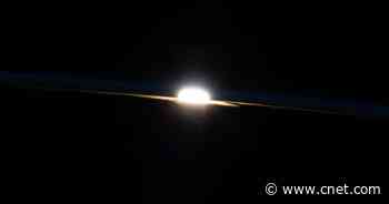 Soul-Stirring Orbital Sunset Shines Over Earth in NASA Image     - CNET