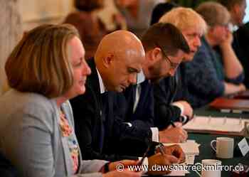 UK's Johnson vows to stay on despite top tier resignations - Dawson Creek Mirror