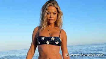 Denise Richards rocks patriotic bikini to celebrate July 4th on the beach after joining OnlyFans