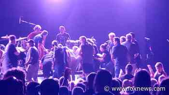 Guitar legend Carlos Santana collapses on stage during concert in Michigan