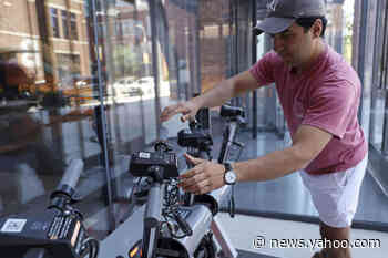 Office workers now dash about city on their own e-scooters as use spreads to private developments - Yahoo News