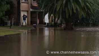Sydney residents assess flood damage as wild weather eases - CNA
