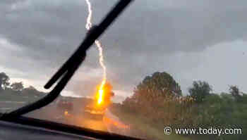 Woman captures moment lightning struck her husband’s truck in wild video