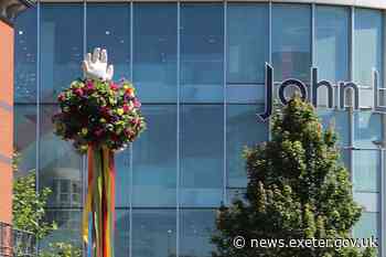 Big white glove back in city centre as Lammas Fair returns - Exeter City Council