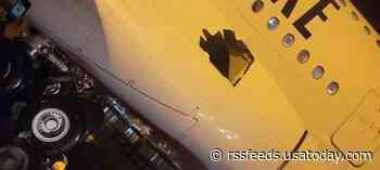 Plane crazy: Emirates aircraft flies from Dubai to Australia with a gaping hole in its side