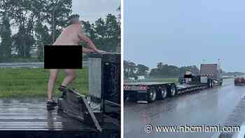 Naked Man Caught on Camera Climbing Tractor Trailer on Interstate Near Sarasota