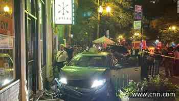 Car jumps curb in downtown Chicago, injuring 6 people, officials say