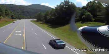 Watch a new pilot narrowly miss cars and power lines while making emergency landing on highway