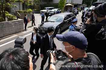 Hearse carrying body of Shinzo Abe returns him home - Ealing Times