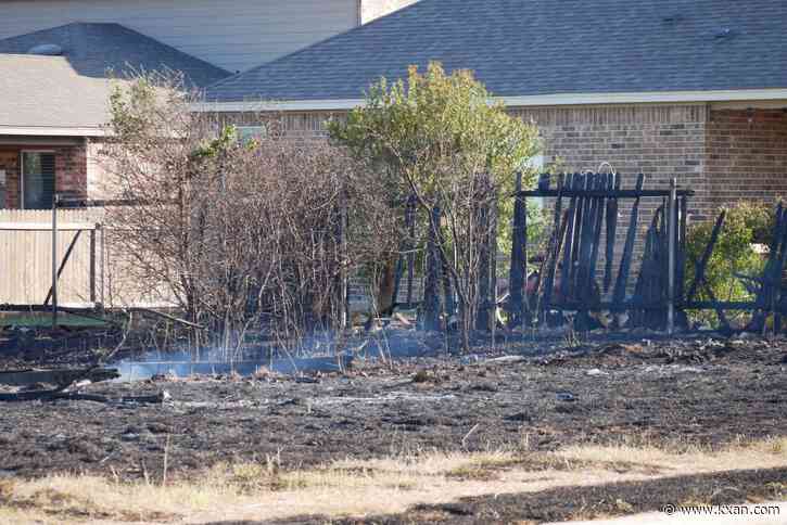 Georgetown grass fire contained after threatening homes