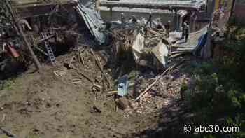 10 killed in rocket attack on Ukrainian apartment building, about 36 could be trapped, officials say