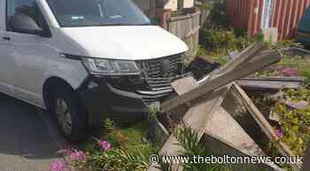Bolton: Huge damage as van driver 'loses control' and crashes into fence