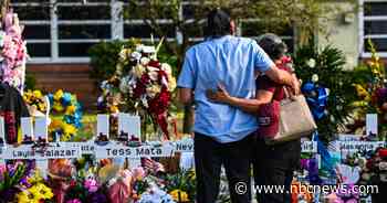 Biden hosts survivors of mass shootings at event celebrating new gun law