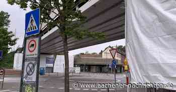 Ladenzeile für Herzogenrath: Fassadenmaler machen Bahnbrücke zum Publikumsmagneten - Aachener Nachrichten