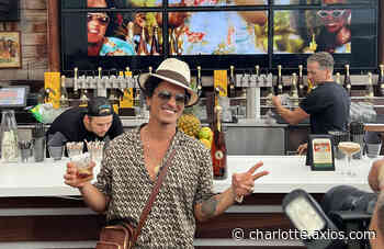 Bruno Mars tours Charlotte's bar scene with rum brand - Axios Charlotte