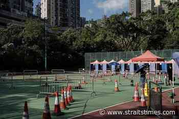 Hong Kong suspends some hospital services as coronavirus cases swell - The Straits Times
