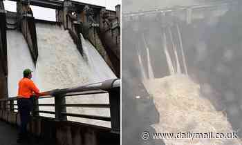 Warragamba Dam overflows, with a major flood risk issued in Sydney's west - Daily Mail