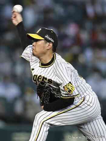 Baseball: Nishi, Tigers hold off Carp, close on third place - Nippon.com