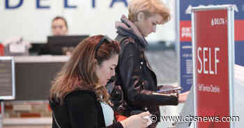 Delta drops rebooking fees ahead of "potentially challenging" July 4 weekend - CBS News