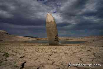 Withering drought shows Lake Mead boat graveyard as reservoir shrinks to record low