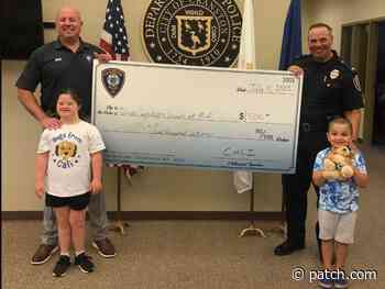 Cranston Police Donate $500 To Down Syndrome Society Of Rhode Island - Patch