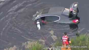 Rescue Workers Respond After Car Crashes Into Canal in Plantation