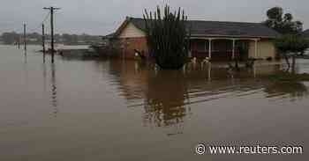 Thousands of Sydney residents return home to assess damage as flood waters recede - Reuters.com