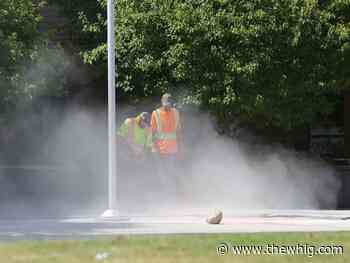 Kingston Police investigating after Holy Cross rainbow crosswalk was defaced - The Kingston Whig-Standard