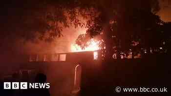 Watch the moment protesters set PM's home on fire