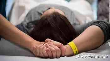 It's a stressful time to be an abortion doula. But many say they aren't quitting