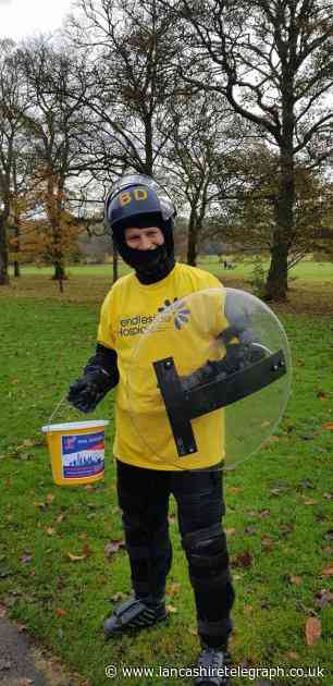 Burnley officer to take place in town's 10k race in riot gear
