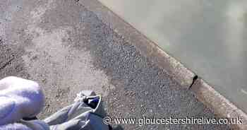 Burst pipe causing Gloucester road to flood with fountains of water - Gloucestershire Live