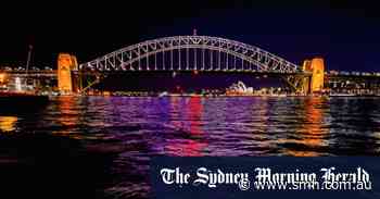 Maroon city: Sydney Harbour Bridge lights up for Queensland - Sydney Morning Herald