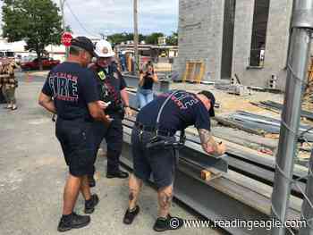 Reading firefighters sign names on steel beam that will top new station - Reading Eagle
