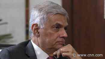 Sri Lanka's acting President says previous government was 'covering up facts' about financial crisis