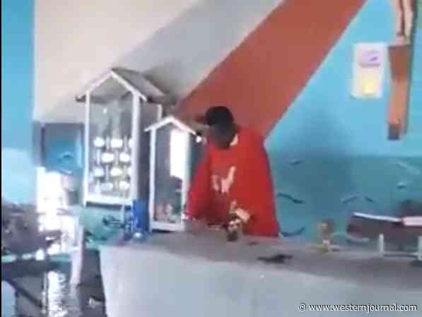 Watch: Christians Worship in Small Boats as Tiny Church Holds Service in Flooded Sanctuary