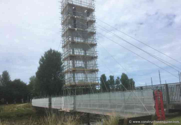 Contractor warns river jumpers not to climb scaffold