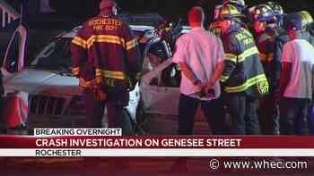 Person trapped after crash on Genesee Street