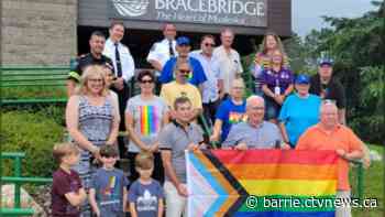 Muskoka Pride flies the progressive rainbow flag